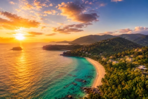 Phuket Luxury Wedding Planner in Thailand | Best Time of Year for a Wedding in Phuket Complete 2026 Guide Aerial view of Phuket Thailand coastline during golden sunset with turquoise Andaman Sea and tropical hills